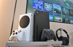 Microsoft's Xbox Series X (black) and series S (white) gaming consoles are displayed at a flagship store of SK Telecom in Seoul on November 10, 2020.