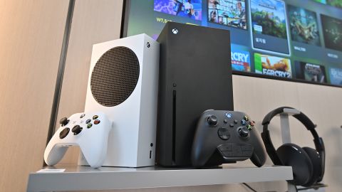 Microsoft's Xbox Series X (black) and series S (white) gaming consoles are displayed at a flagship store of SK Telecom in Seoul on November 10, 2020. (Photo by Jung Yeon-je/AFP/Getty Images)