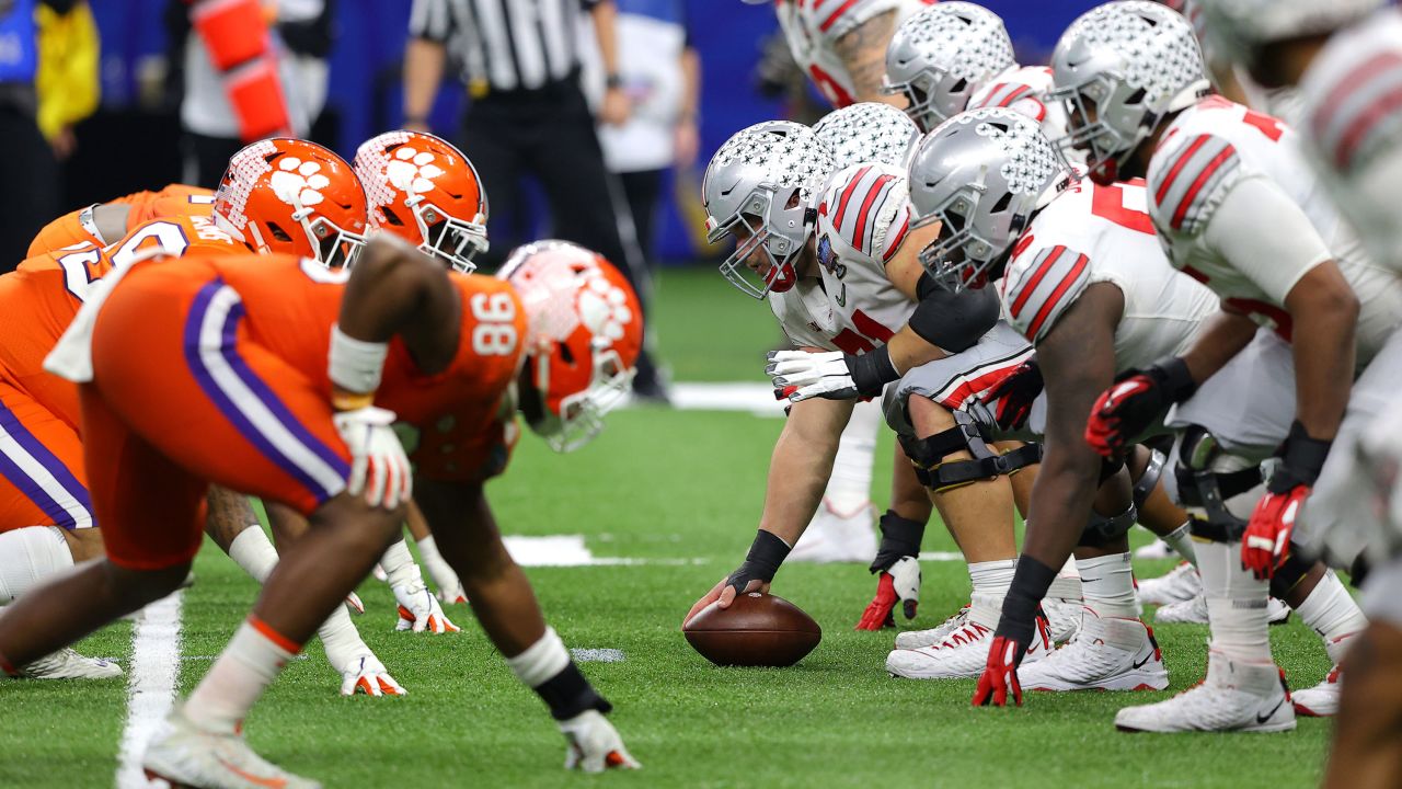 The Ohio State Buckeyes and the Clemson Tigers line up for a snap  during the College Football Playoff semifinal at Mercedes-Benz Superdome on January 01, 2021, in New Orleans.