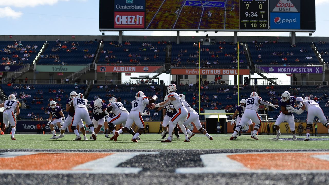 The Auburn Tigers compete against the Northwestern Wildcats during the Vrbo Citrus Bowl at Camping World Stadium on January 1, 2021, in Orlando, Florida.