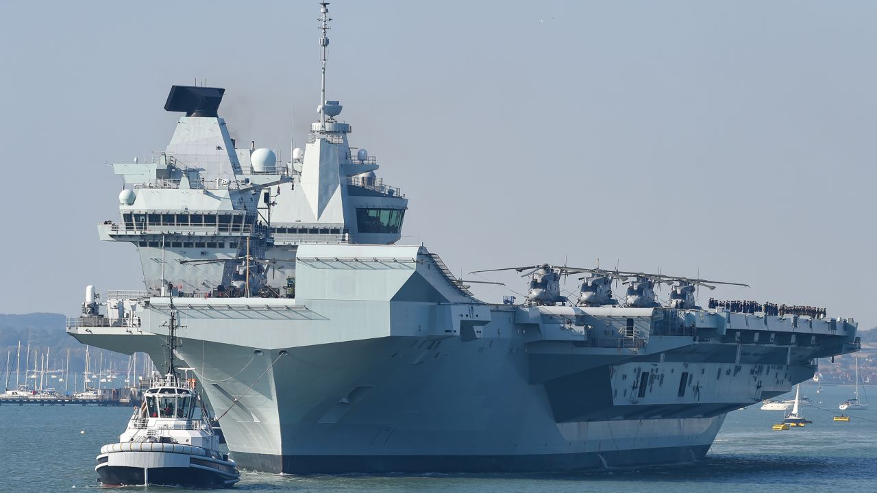 HMS Queen Elizabeth departs from the Royal Navy base in Portsmouth, England, on September 21, 2020.