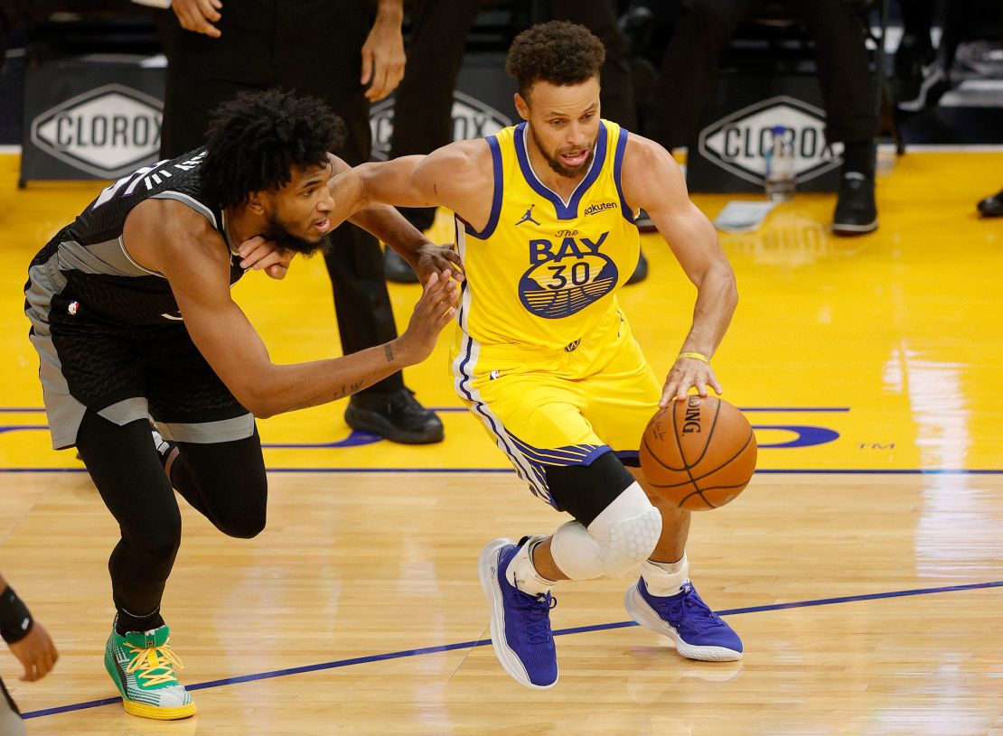 Curry is guarded by Marvin Bagley III of the Sacramento Kings at Chase Center.