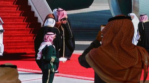 Saudi Crown Prince Mohammed bin Salman embraces Qatar's Emir ahead of the summit in Saudi Arabia on Tuesday. 