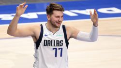 DALLAS, TEXAS - DECEMBER 17:  Luka Doncic #77 of the Dallas Mavericks reacts against the Minnesota Timberwolves in the second half during a preseason game at American Airlines Center on December 17, 2020 in Dallas, Texas.  NOTE TO USER: User expressly acknowledges and agrees that, by downloading and/or using this Photograph, User is consenting to the terms and conditions of the Getty Images License Agreement.  (Photo by Ronald Martinez/Getty Images)