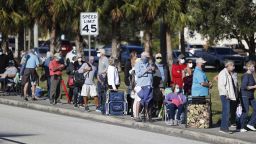 FORT MYERS, FL - DECEMBER 30: Seniors and first responders wait in line to receive a COVID-19 vaccine at the Lakes Regional Library on December 30, 2020 in Fort Myers, Florida. There were 800 doses of vaccine available at the site. (Photo by Octavio Jones/Getty Images)