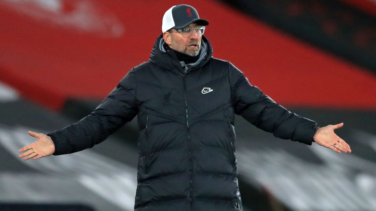 Liverpool's German manager Jurgen Klopp gestures on the touchline during the English Premier League football match between Southampton and Liverpool at St Mary's Stadium in Southampton, southern England on January 4, 2021. (Photo by Adam Davy / POOL / AFP) / RESTRICTED TO EDITORIAL USE. No use with unauthorized audio, video, data, fixture lists, club/league logos or 'live' services. Online in-match use limited to 120 images. An additional 40 images may be used in extra time. No video emulation. Social media in-match use limited to 120 images. An additional 40 images may be used in extra time. No use in betting publications, games or single club/league/player publications. /  (Photo by ADAM DAVY/POOL/AFP via Getty Images)