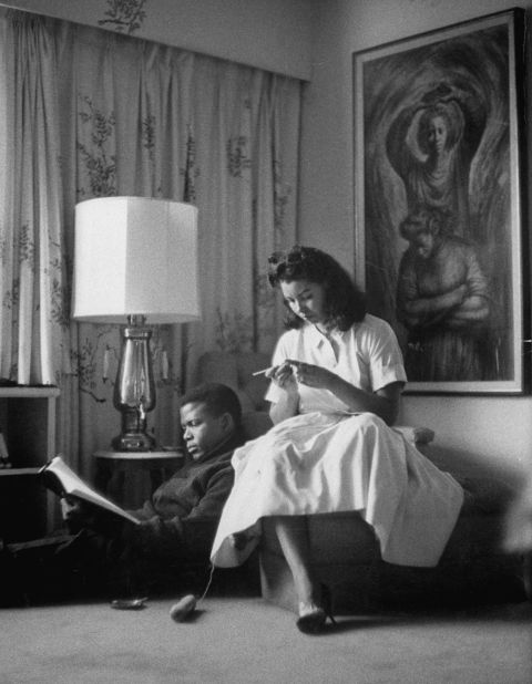 Poitier and his first wife, Juanita, relax at their home in New York in 1959. They had four daughters before divorcing in 1965.