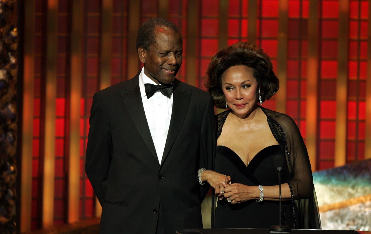 Poitier and Diahann Carroll present an award at the NAACP Image Awards in 2005.
