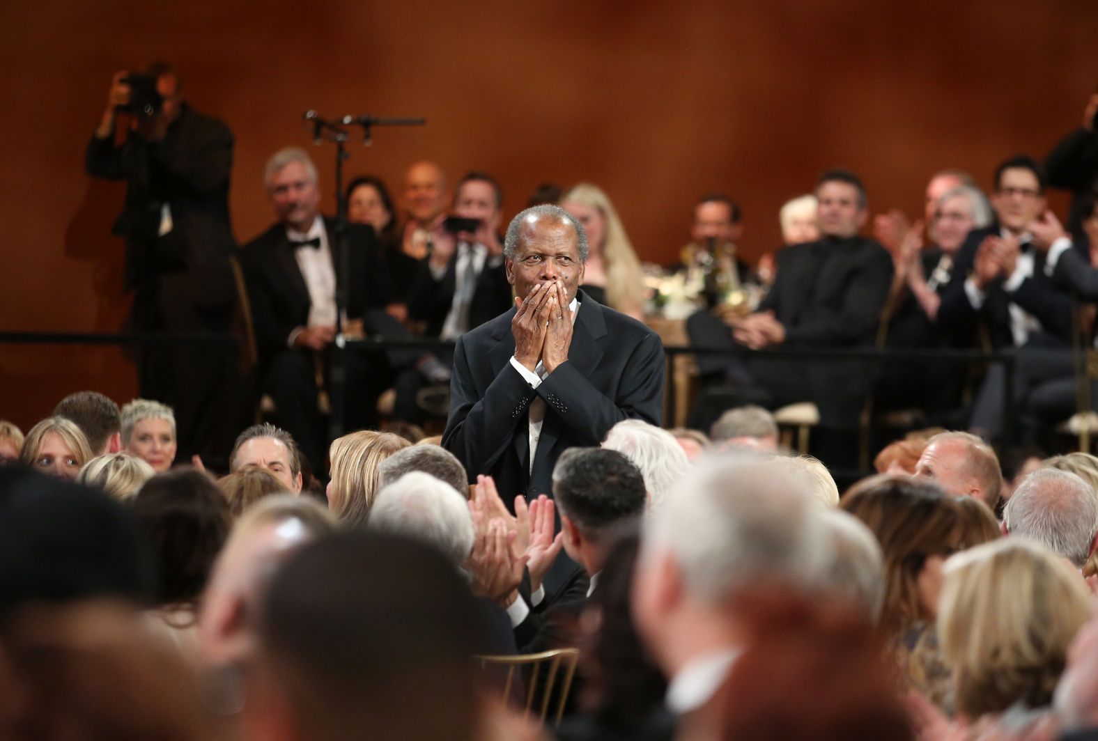 Poitier attends a tribute to actress Shirley MacLaine in 2012.