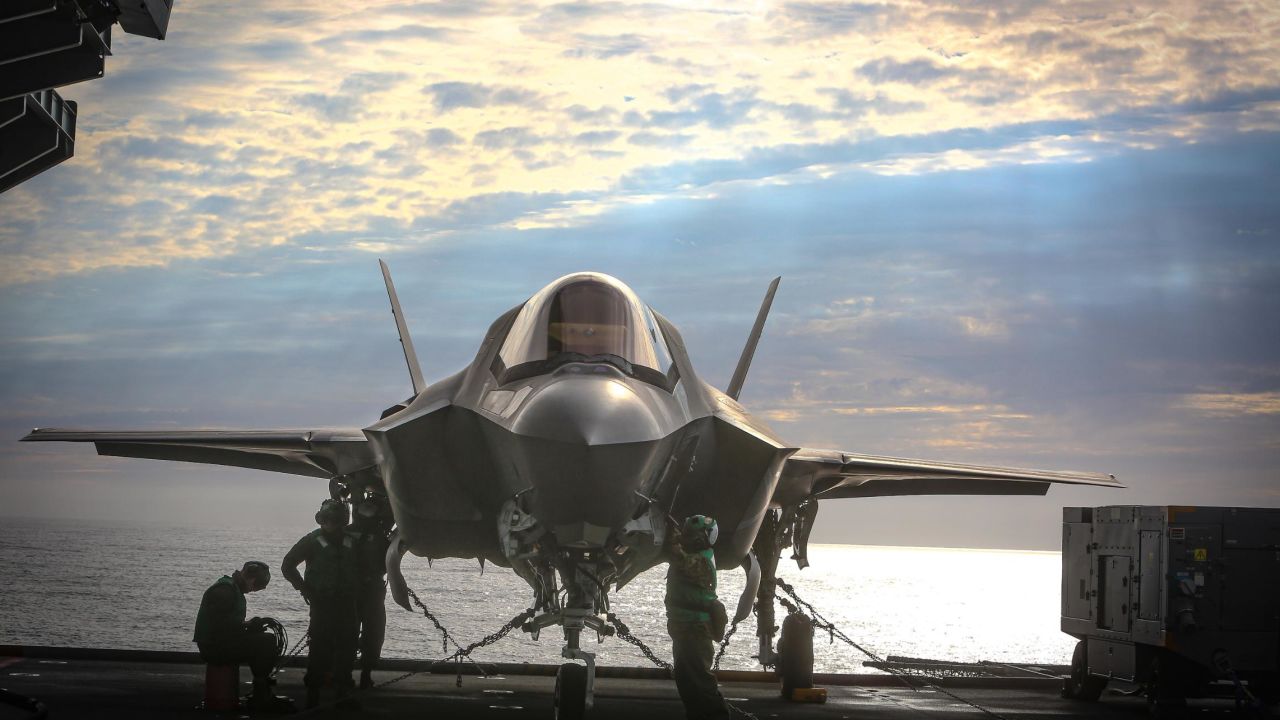 US Marines complete pre-flight checks in an F-35B jet aboard HMS Queen Elizabeth at sea on September 28, 2020. 