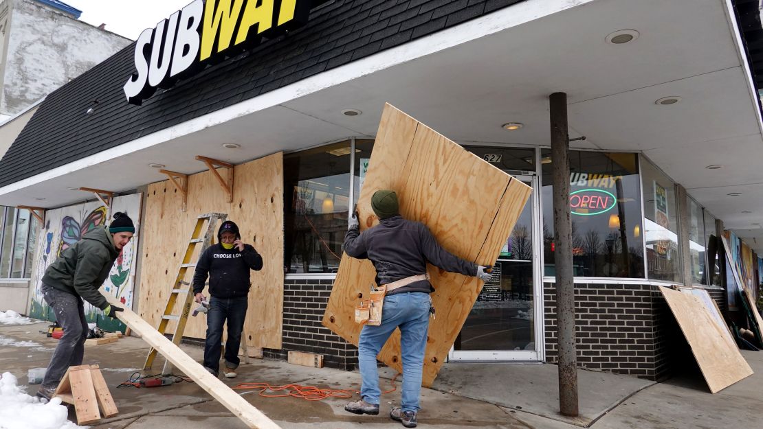 A Subway restaurant and other businesses in downtown Kenosha were boarded up ahead of a charging decision in Blake's case.