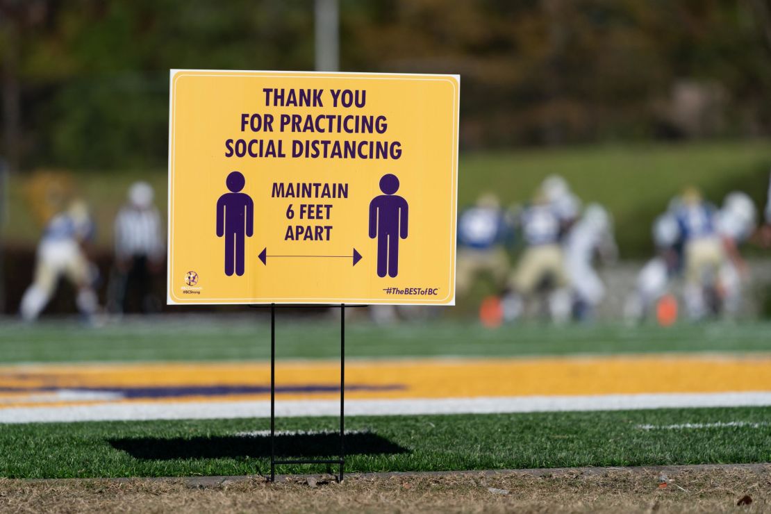 A sign encourages social distancing as Southside Christian plays Lake View during a state high school football championship game at Benedict College, December 5, 2020, in Columbia, South Carolina. 