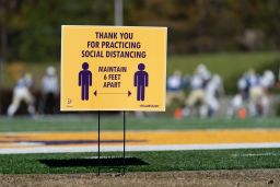 A sign encourages social distancing as Southside Christian plays Lake View during a state high school football championship game at Benedict College, December 5, 2020, in Columbia, South Carolina. 