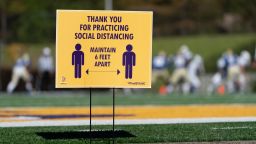 A sign encourages social distancing as Southside Christian plays Lake View during the South Carolina High School League Class A football championship game at Benedict College on December 5, 2020, in Columbia, South Carolina. 
