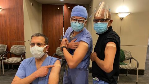 Drs. Faisal Masud, Steven Hsu, and Dharamvir Jain pose after receiving vaccinations at Houston Methodist Hospital on December 15, 2020.