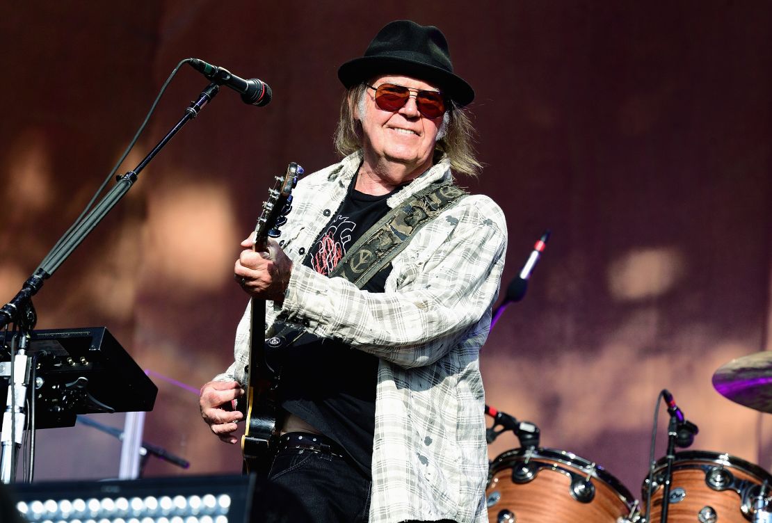 Neil Young, pictured here on stage in London in 2019, became a household name in the 1960s.