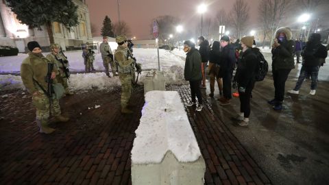 Protesters confronted National Guard members near the Kenosha County Courthouse on Tuesday night.