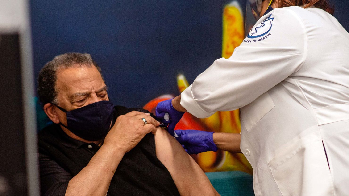 Former US Ambassador to the UN Andrew Young receives a Covid-19 vaccination on Tuesday.