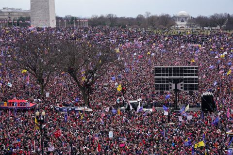 People rally near the White House in support of Trump.
