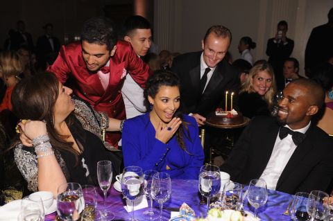 Kim gets a cake while attending the Angel Ball in New York in October 2012. Her birthday was a day earlier.
