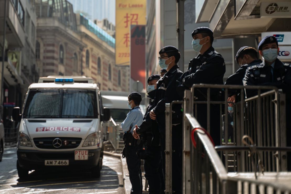 Police seen in downtown Hong Kong on January 6, 2021, as dozens of opposition figures are arrested across the city. 