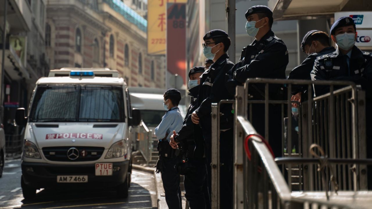 Police seen in downtown Hong Kong on January 6, 2021, as dozens of opposition figures are arrested across the city.