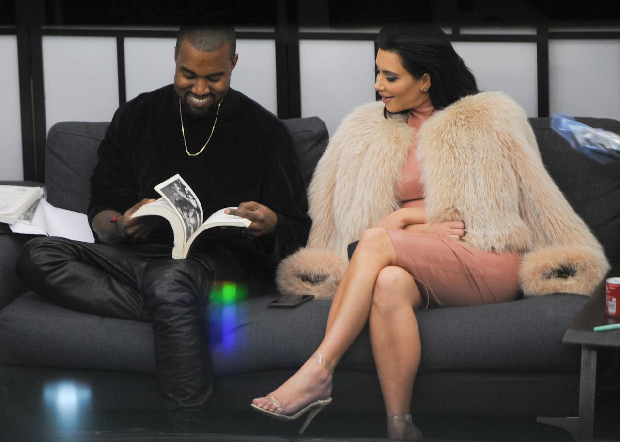 The couple visits a tattoo salon in London in February 2015.