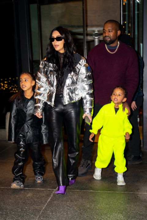 From left, North, Kim, Kanye and Saint walt together in New York in December 2019.