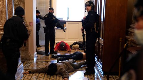 US Capitol Police detain rioters outside of the House Chamber during a joint session of Congress on January 6, 2021. (Drew Angerer/Getty Images)