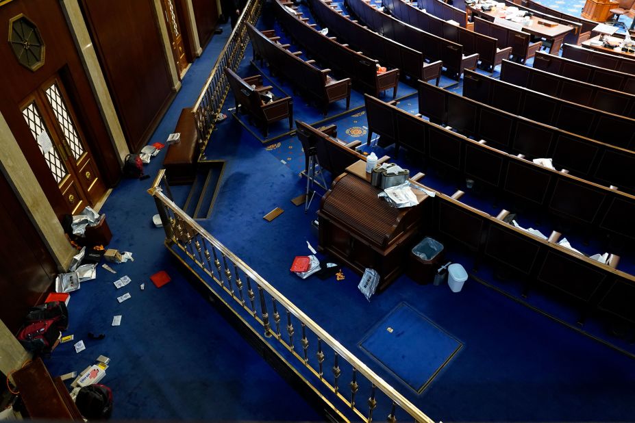 Papers and other materials litter the House chamber after it was evacuated.