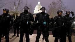 WASHINGTON, DC - JANUARY 06: Police officers in riot gear line up as protesters gather on the U.S. Capitol Building on January 06, 2021 in Washington, DC. Pro-Trump protesters entered the U.S. Capitol building after mass demonstrations in the nation's capital during a joint session Congress to ratify President-elect Joe Biden's 306-232 Electoral College win over President Donald Trump. (Photo by Tasos Katopodis/Getty Images)