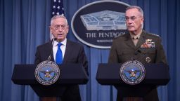 US Defense Secretary Jim Mattis (L) and chairman of the Joint Chiefs of Staff Gen. Joseph Dunford hold a press conference at the Pentagon in Washington, DC, on August 28, 2018. (Photo by NICHOLAS KAMM / AFP)        (Photo credit should read NICHOLAS KAMM/AFP via Getty Images)
