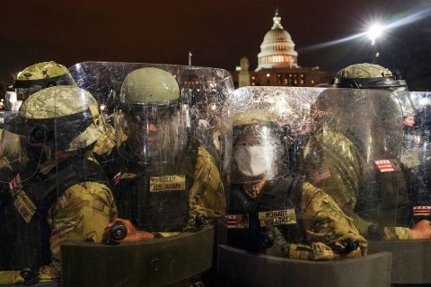 Members of the DC National Guard stand outside the Capitol after the riots.