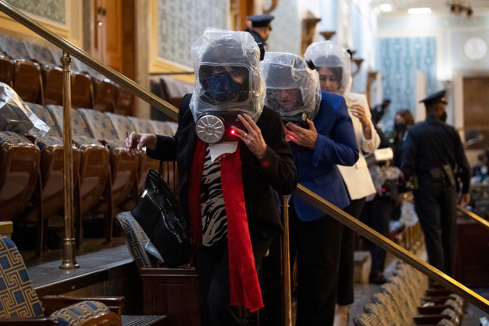 US Reps. Lucille Roybal-Allard and Annie Kuster take cover while rioters were in the Capitol.