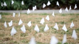 Flags symbolize those who have died of the coronavirus at a live COVID-19 memorial outside the City-County Building in Knoxville, Tenn. on Wednesday, Dec. 30, 2020. More flags will be added as deaths continue.Kns Covid Memorial RANK3