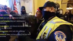 Livestream video appears to show a Capitol Hill police officer taking a selfie with a rioter inside the building.  
 
The snippet of livestream posted online is short and it's unclear what prompted, or followed, the interaction.
CNN has reached out to the Capital Hill Police for comment about the incident.
