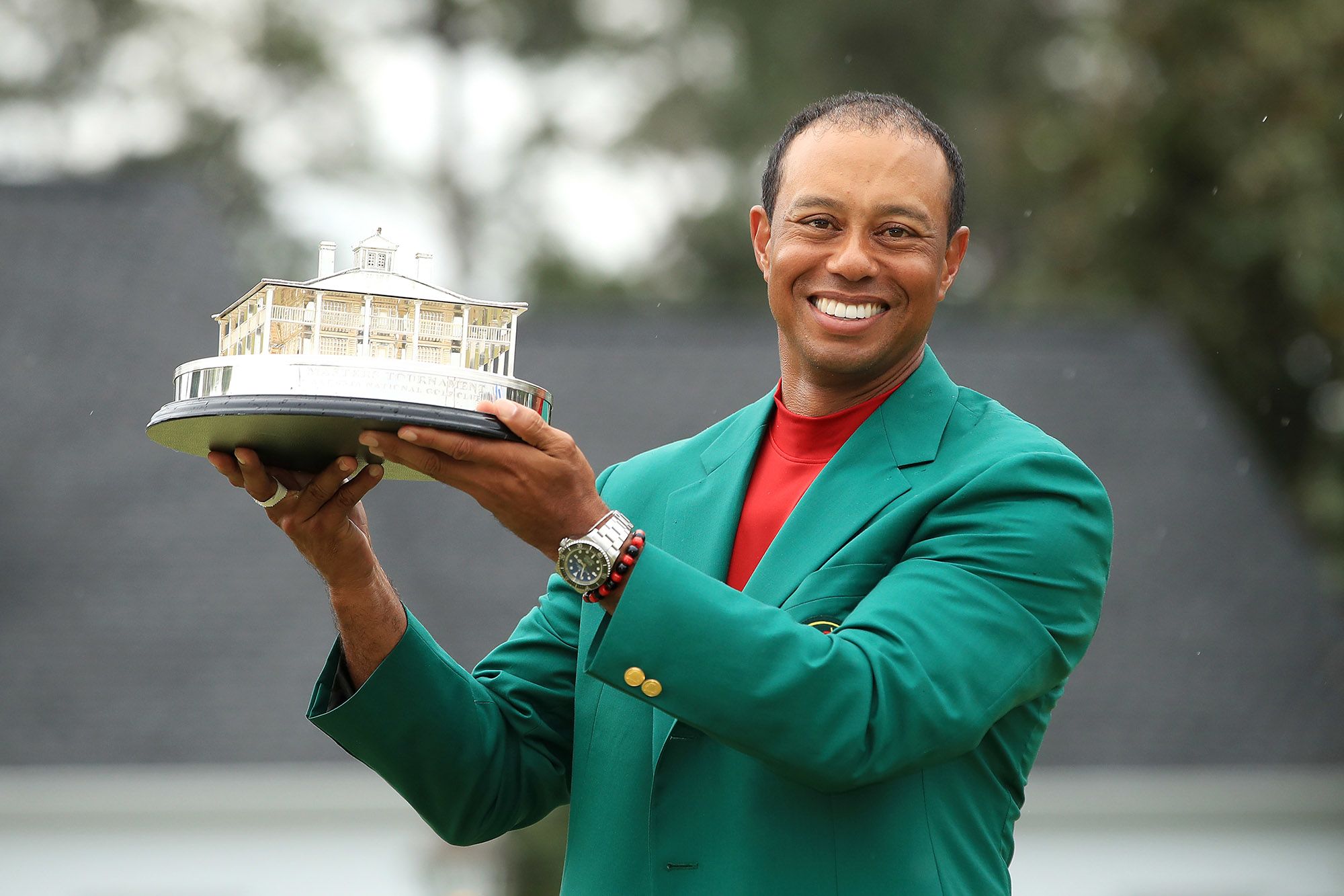 Woods celebrates with the Masters Trophy after winning it for the fifth time. 