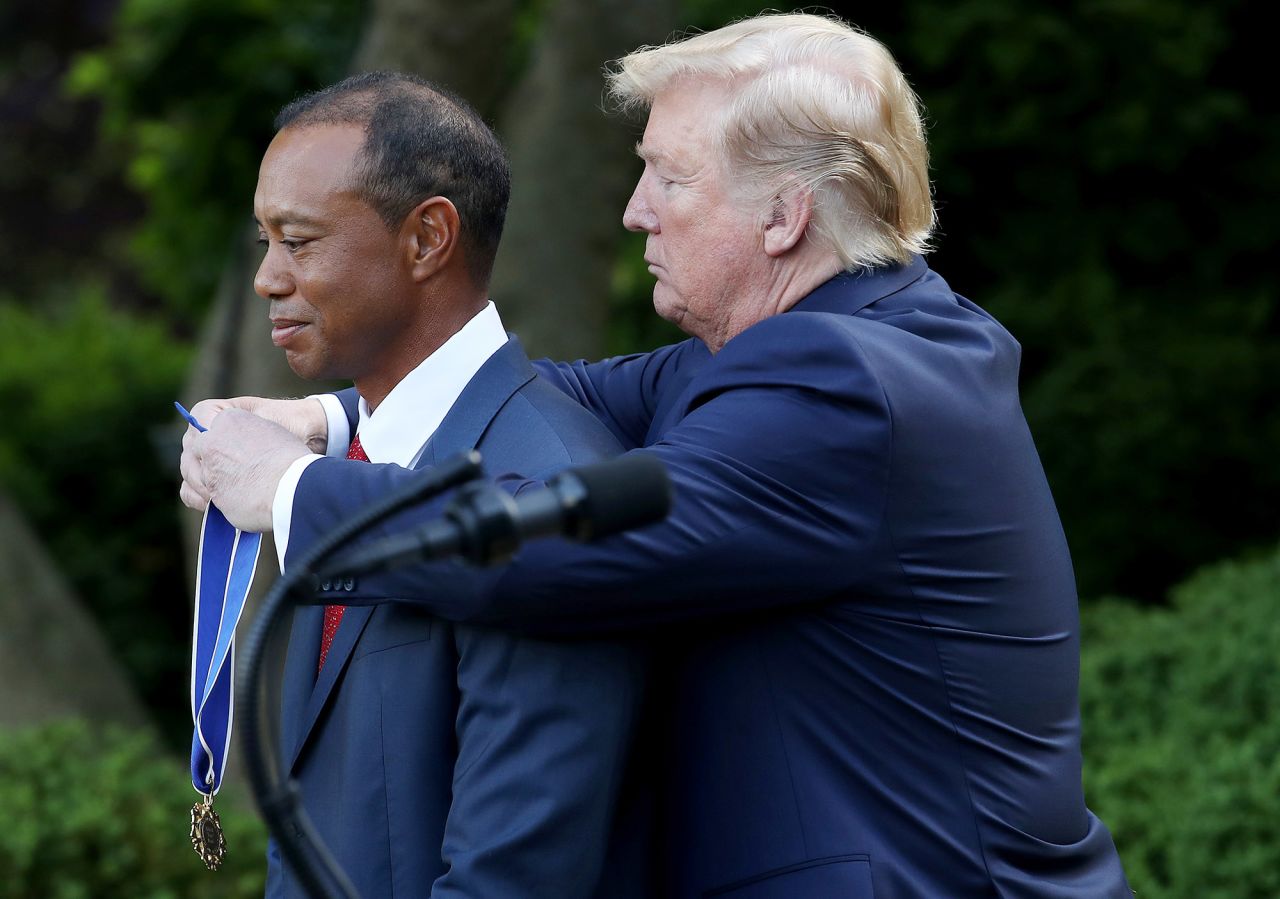 US President Donald Trump presents Woods with the Medal of Freedom after his Masters victory in 2019.
