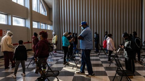 Voters wait at a polling location during Tuesday's Senate runoff elections in Atlanta.
