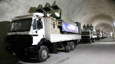 Missiles on mobile truck launchers on display at the base.
