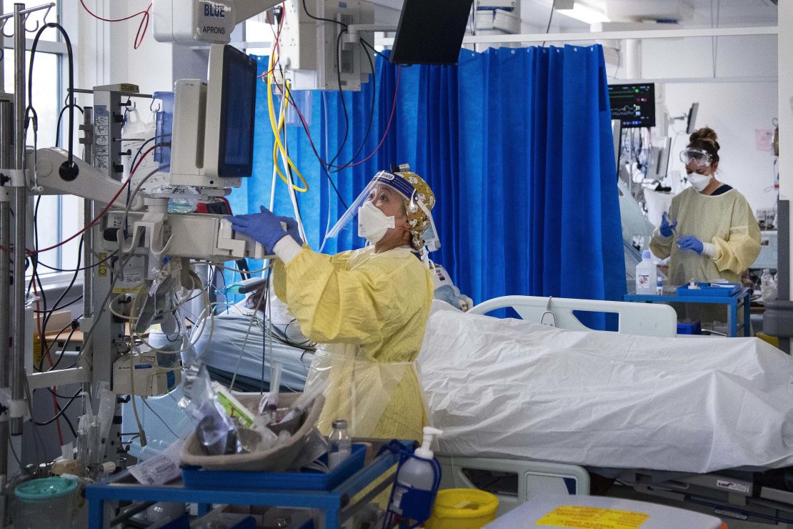 Nurses work on patients in the ICU in St George's Hospital in Tooting, southwest London.