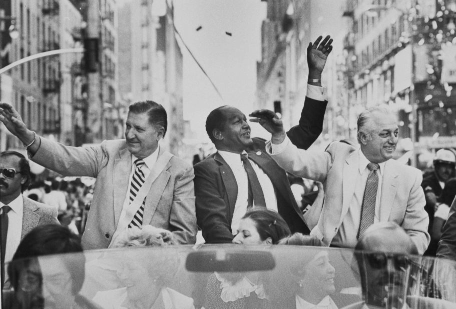 From left, Al Campanis, vice president of player personnel for the Dodgers, Los Angeles Mayor Tom Bradley and Lasorda during a parade through the streets of Los Angeles in October 1981, celebrating the Dodgers' victory in the World Series.