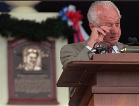 Lasorda wipes his eye in August 1997 during his induction into the Baseball Hall of Fame in Cooperstown, New York.