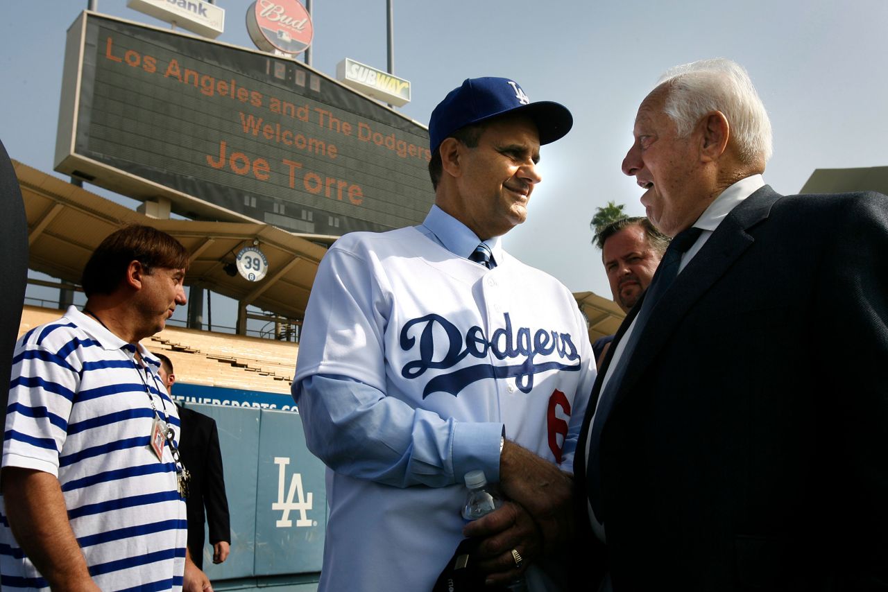 Incoming Dodgers manager Joe Torre talks with Lasorda after a press conference in November 2007.