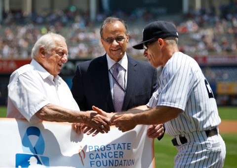 New York Yankees manager Joe Girardi, right, greets Lasorda, left, and Joe Torre before the start of a game at Yankee Stadium in New York in June 2015. Lasorda and Torre, both Hall of Fame managers, were part of a pregame ceremony for the Prostate Cancer Foundation.