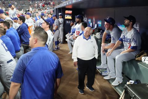 Lasorda stands in the dugout before Game 3 of the National League Division Series between the Dodgers and the Atlanta Braves at SunTrust Park in Atlanta in October 2018.