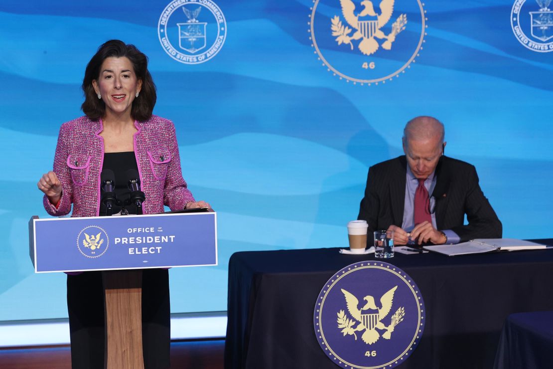 Rhode Island Gov. Gina Raimondo (L) delivers remarks after U.S. President-elect Joe Biden (R) announced her as his Commerce Secretary nominee at The Queen theater on January 08, 2021 in Wilmington, Delaware. 