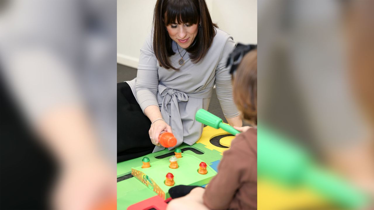 Clinical psychologist Robyn Koslowitz (left), director of the Targeted Parenting Institute, advised parents to engage in their toddler's playtime. Why not try Whac-a-Mole?