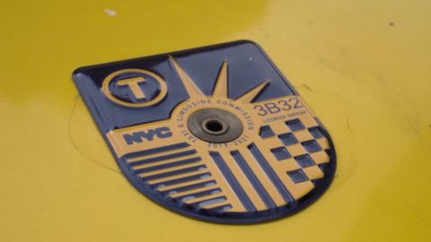 A taxi medallion.