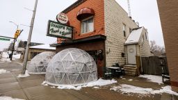 Patrons dine in igloos outside of Champs Pub in Brighton, Mich., which has been selected to receive a financial lifeline from the Barstool fund founded by Dave Portnoy to aid small businesses struggling to stay afloat during the coronavirus pandemic.Champspub 010521 Kpm 132